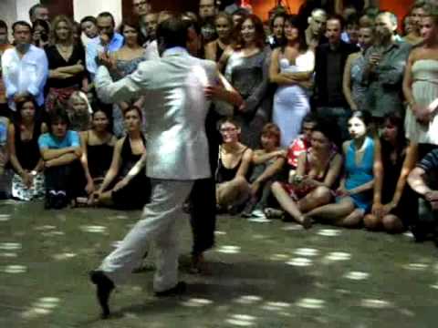  Silvina Valz  and  Oliver Kolker  are  dancing  to  the  tango  "  Sinsabor  "