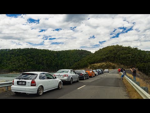 Bunch of dudes convoy through the mountain ranges
