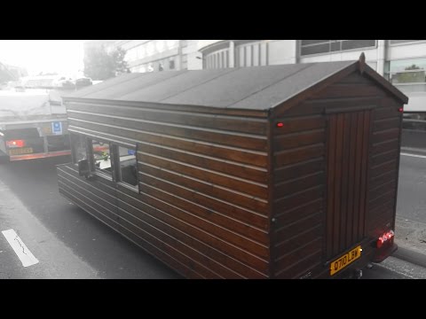 WORLD'S FASTEST SHED. A Log Cabin van traverses the streets of London.