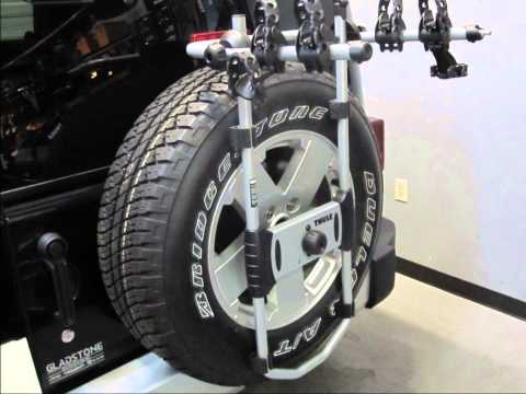 Jeep Wrangler Unlimited Spare Tire Bike Rack Thule SpareMe 963PRO by Rack Outfitters