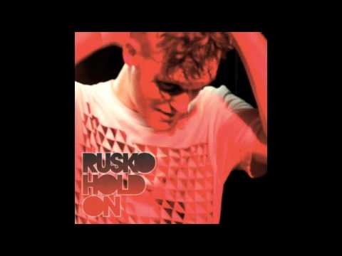 Rusko - Hold On (Sub Focus Remix) [Official Full Screen]