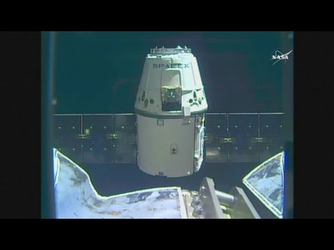 SpaceX Dragon docks with the International Space Station