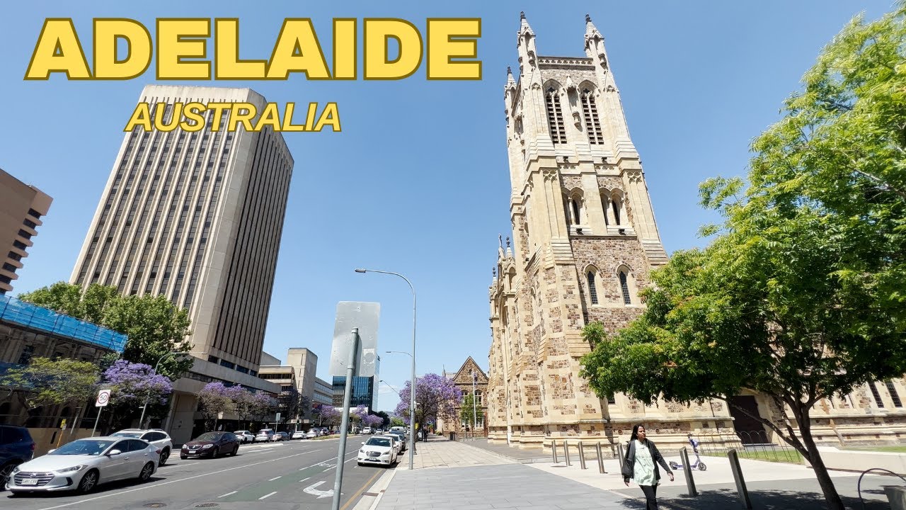 Walk Victoria Square with heritage buildings and vibrant street scenes.