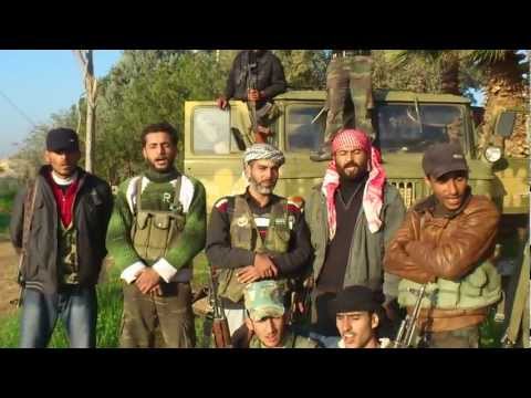 مجموعة من مقاتلي كتيبة جند الحرمين يعلنون في بيان الأوضاع العسكرية لمعركة السيطرة على سد تشرين في منطقة منبج