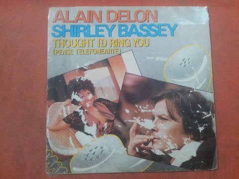 SHIRLEY BASSEY & ALAIN DELON.(THOUGHT I'D RING YOU.(PENSE TELEFONEARTE.(VOCAL.)(7''.)(1983.)