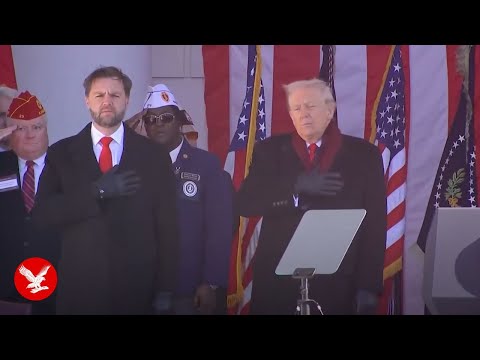 Trump sings along to a handful of words of God Bless America at Veterans Day event