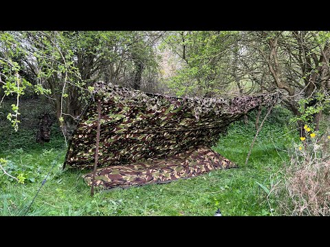 Early spring camp using military gear. Dutch army bivvi, British army Basha shelter.