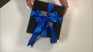 Gift Wrapping - How to make a double bow on the box