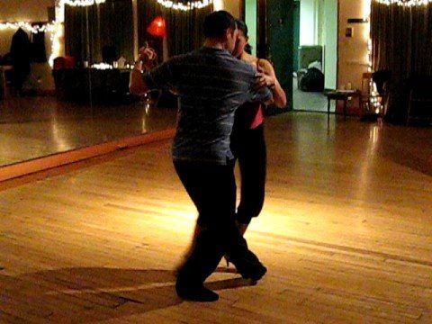  Diego Benavidez  and  Natasha Agudelo  are  dancing  to  the  tango  "  Tres Esquinas  "