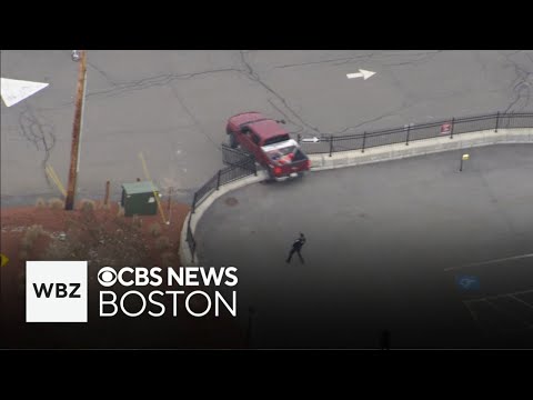 Truck crashes through fence during police chase on North Shore