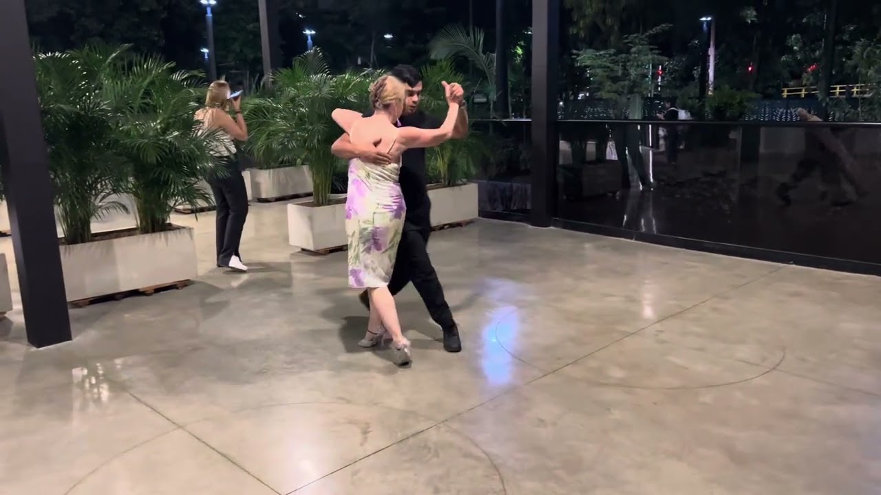 Medellin Julia Amstis and Edwin Cardenas review some milonga figures.  Milonga Argentina.