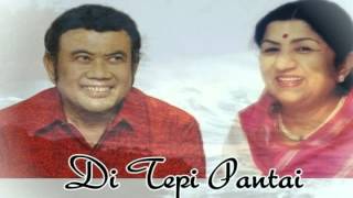 Download lagu Di Tepi Pantai - Rhoma Irama & Latta Mangeskar mp3 Download lagu Di Tepi Pantai - Rhoma Irama & Latta Mangeskar mp3