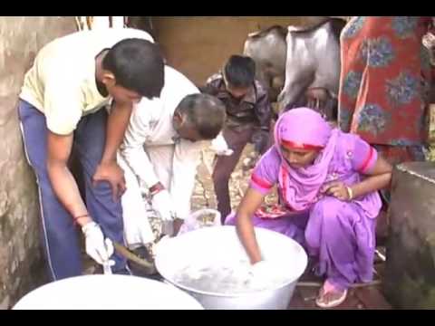 Mr. Ashok Kumar and his family working in their farm