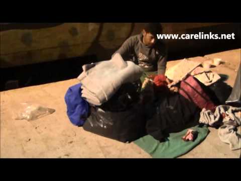 Migrant refugee Child Cold on Railway Station Platform as Train Leaves Serbian Border