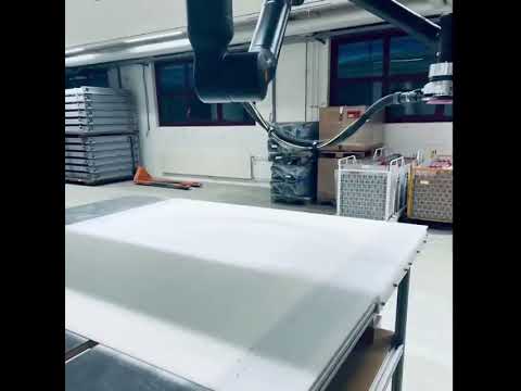 Ceiling-mounted Cobot KR1410 Grinds Acrylic Sheets