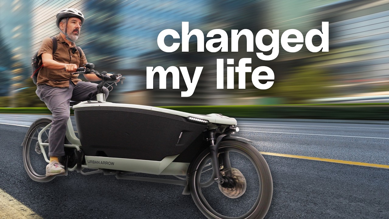 Andrew Hawkins from The Verge riding an electric cargo bike through Brooklyn, New York