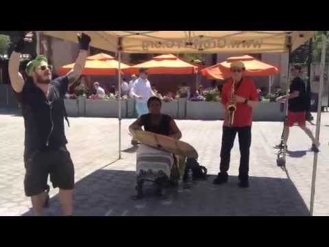 Sophie Nzayisenga, Jeremy Danneman, and  Crazy Dancing Man at the Union Square Farmers Market