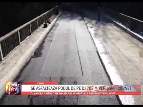 SE ASFALTEAZA PODUL DE PE  DJ 703 M PERISANI - CORNET