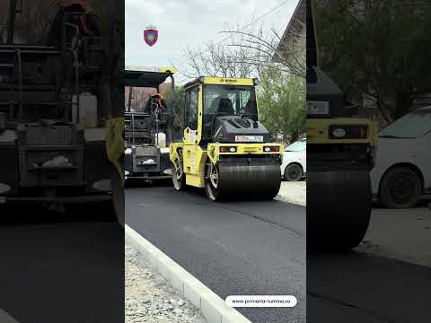 Strada Tulcei intră în asfaltare: se toarnă covorul asfaltic pe primul tronson