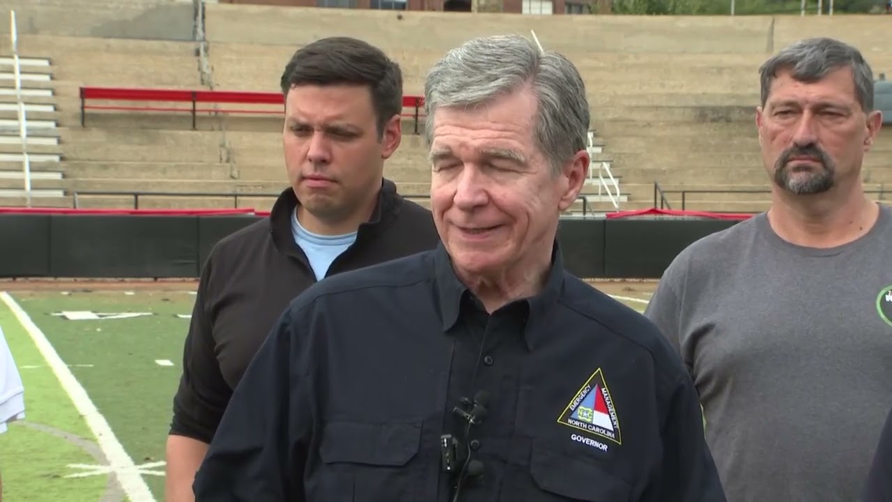 Gov. Roy Cooper surveys damage from Helene in Canton