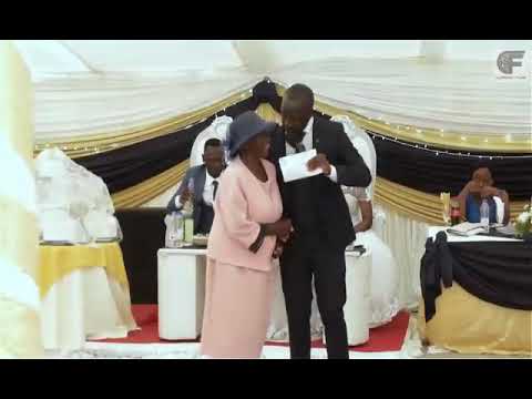 MC ZANAMWE WITH GOGO FROM MALAWI