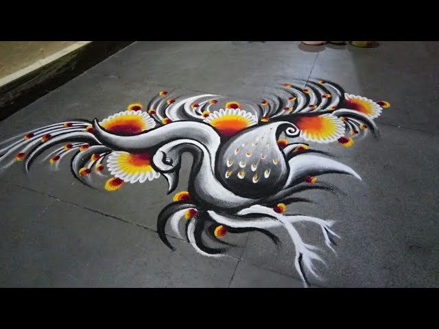 Peacock rangoli design in black and white