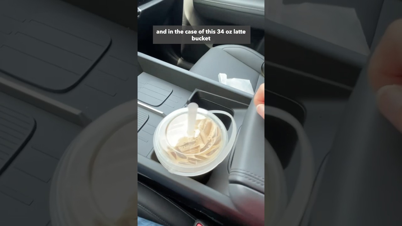Can you store a gigantic latte bucket in the Hyundai Santa Fe cup holders? | Consumer Reports