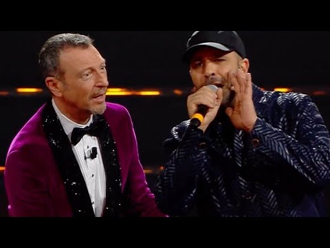 Sanremo 2022 - Checco Zalone canta Poco Ricco poi interpreta il virologo cugino di Albano