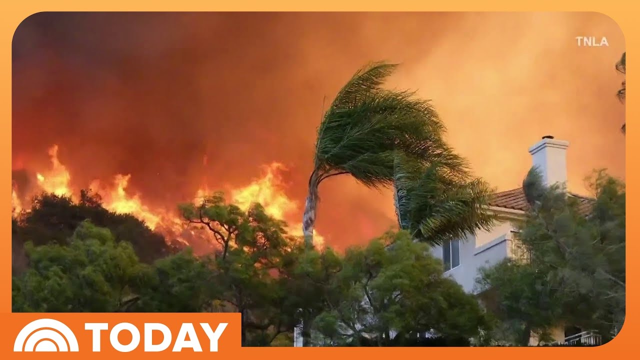 Firefighters race to contain LA wildfires before winds pick up again