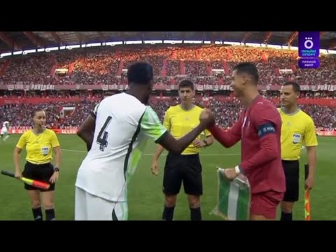 Nigerian Super Eagles players in green jerseys dejectedly walking off the field after a penalty shootout loss to DR Congo in 