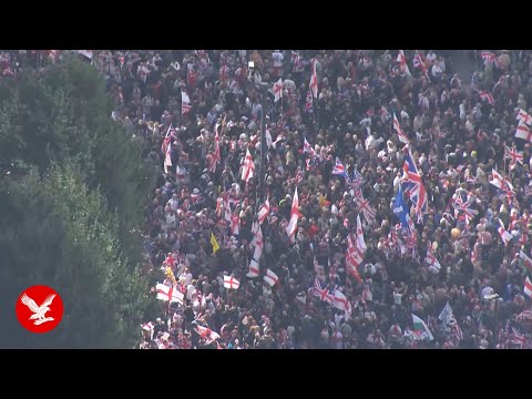 Thousands turn out for Tommy Robinson rally and counter-protest