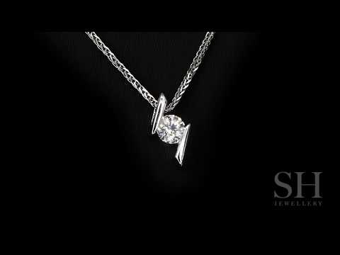 W0557  0.70ct   Diagonal floating diamond pendant (small)