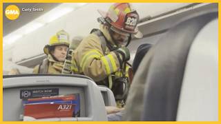 Several passengers burned on flight after laptop burst into flames