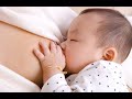 Beautiful Baby And Cute Mom Breastfeeding By