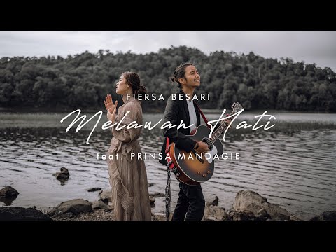 FIERSA BESARI - Melawan Hati feat. PRINSA MANDAGIE (Official Video Lyrics)