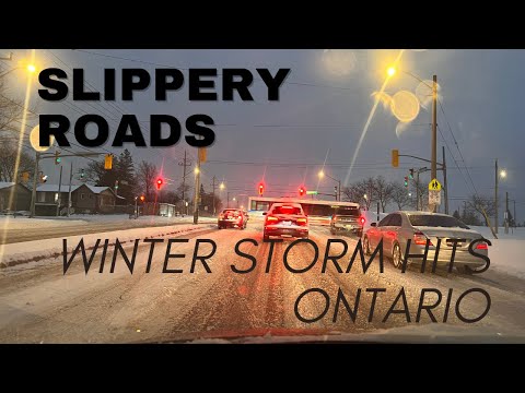 Car sliding and crash in heavy snow storm