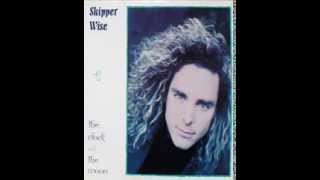 skipper wise - standing outside in the rain