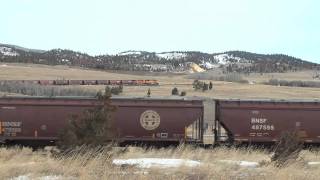 preview picture of video 'BNSF/Montana Rail Link grain train tackles Mullan Pass'
