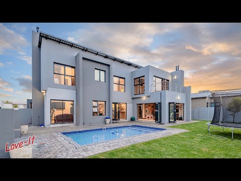 Midstream Ridge | Home with a view on a large stand.