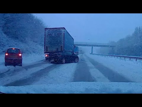 Car Crashes Into Lorry On Snowy Motorway