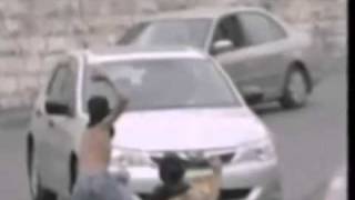 Man runs over kids throwing rocks Video
