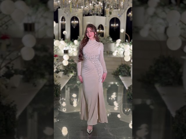 فستان بيج ملكي بتطريز كريستال وقصة ناعمة