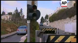Israel arrests 2 UK consulate workers in Jerusalem; consulate exteriors, stadium
