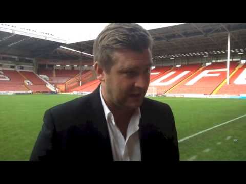 Karl Robinson reacts to Sheffield United win
