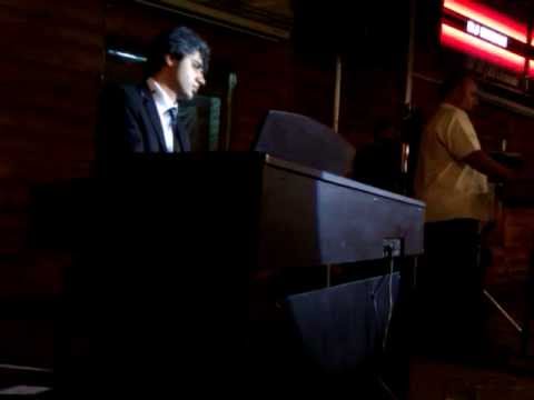 Mehrzad Soltaninia(playing piano)