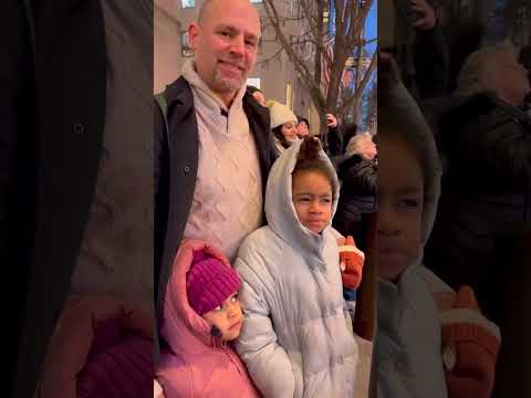 Seeing the light show on Saks 5th avenue at Rockefeller center New York