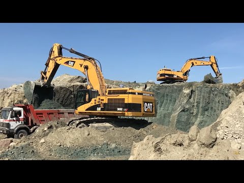 Caterpillar 365C Excavator Loading Trucks With 3 Passes
