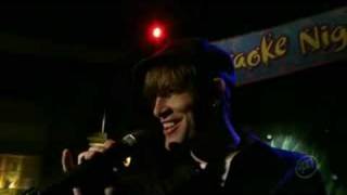 His songs were used in several episodes of the show, and "We Used To Be Friends" was the song in the series' opening credits. It only seemed natural that The Dandy Warhols' lead singer would appear on the show. Of course, it's a karaoke scene.