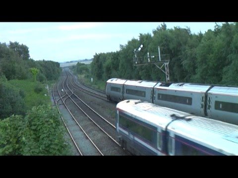 57307 and 390023 on Euston - Holyhead and 175011 on 1K07, 19:35, Holyhead - Crewe