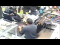 New York shopkeeper chases armed robber with ...